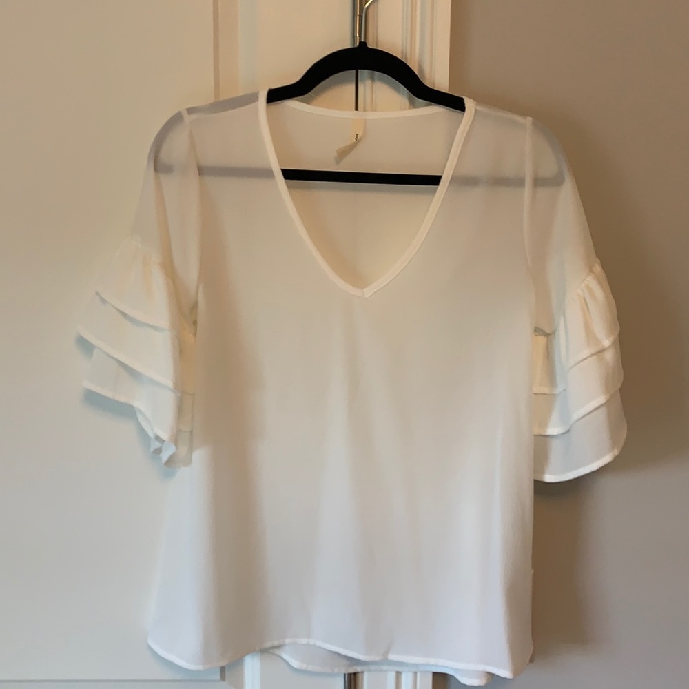White blouse with detailed sleeves